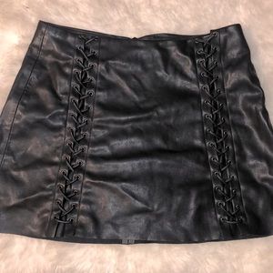 Laced leather black skirt